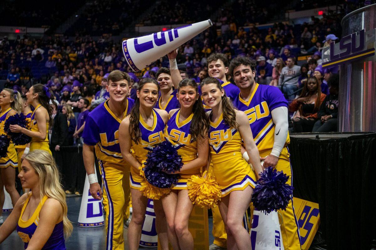 LSU cheerleaders smile at halftime Saturday, Feb. 26, 2022, during LSU&#8217;s 75-55 win against Missouri in the Pete Maravich Assembly Center on North Stadium Drive in Baton Rouge, La.