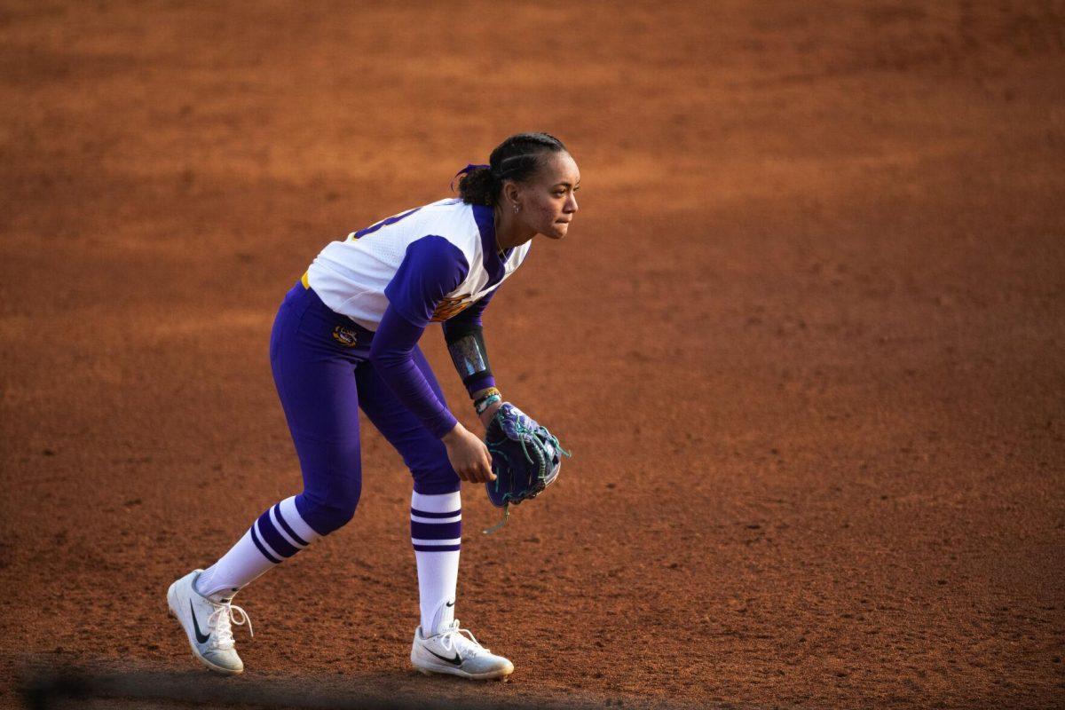 LSU softball sophomore infielder Danieca Coffey (13) gets in a defensive stance Saturday, Feb. 12, 2022, during LSU’s 8-1 win against South Alabama at Tiger Park on Skip Bertman Drive in Baton Rouge, La.