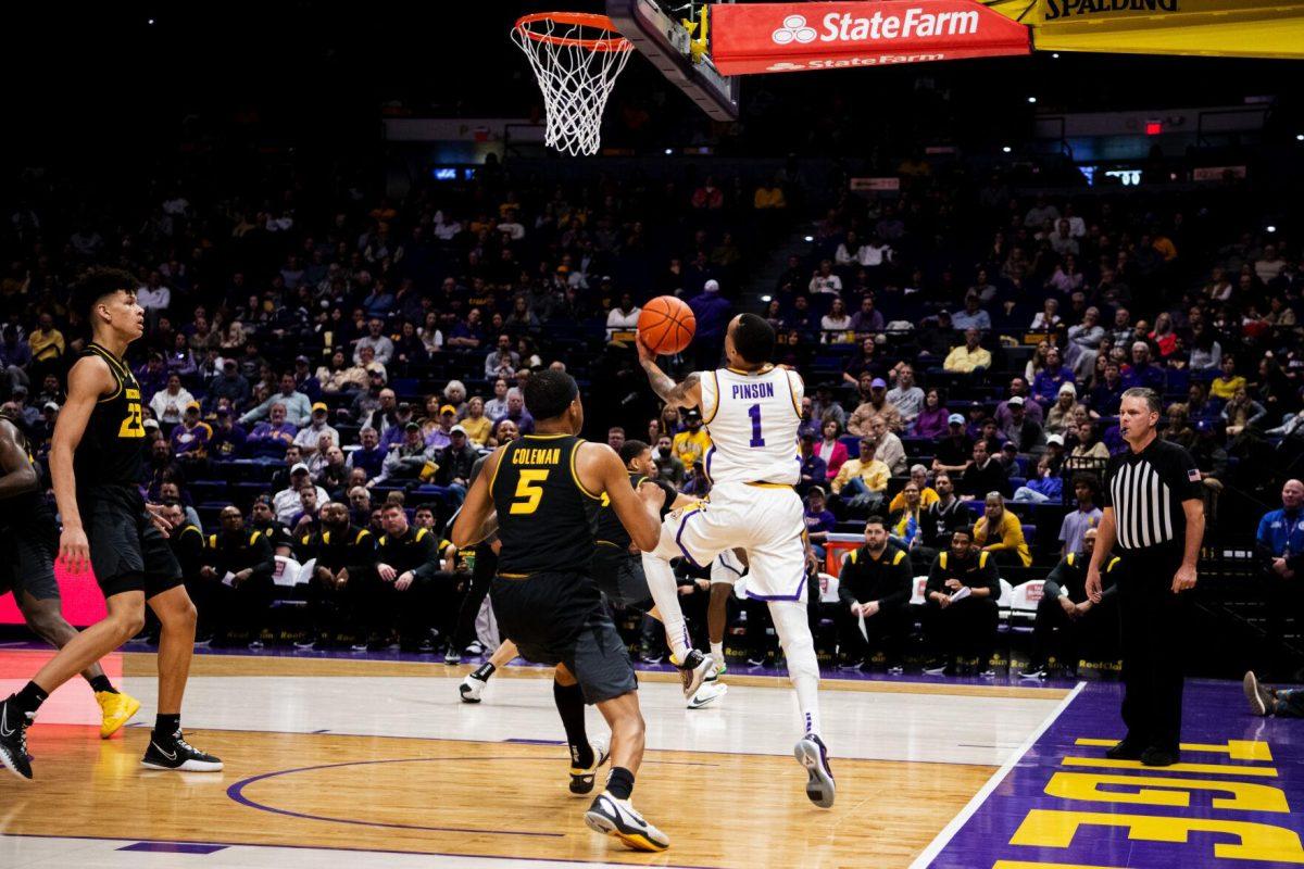 LSU men&#8217;s basketball senior guard Xavier Pinson (1) attempts a layup from the baseline Saturday, Feb. 26, 2022, during LSU&#8217;s 75-55 win against Missouri in the Pete Maravich Assembly Center on North Stadium Drive in Baton Rouge, La.