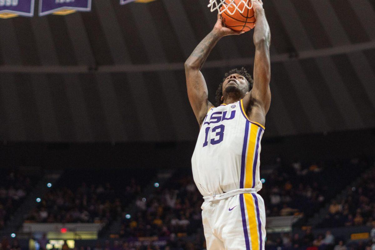 LSU men&#8217;s basketball sophomore forward Tari Eason (13) dunks the ball on Saturday, Feb. 12, 2022, during LSU&#8217;s 69-65 win over Mississippi State at the Pete Maravich Assembly Center on North Stadium Drive in Baton Rouge, La.