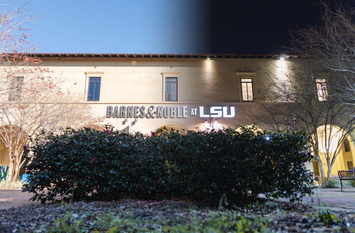 The Sun shines on the LSU bookstore on Saturday, Jan. 22, 2022, while artificial lighting glows on the bookstore on the night of Sunday, Jan. 23, 2022, in Baton Rouge, La.