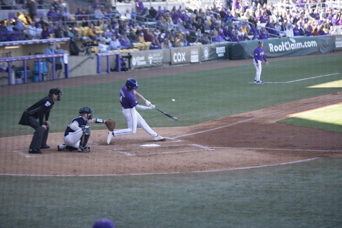 LSU sophomore infielder Cade Doughty (4) swings at bat Saturday, Feb. 19, 2022, during the Tigers' 17-8 win against the University of Maine at Alex Box Stadium in Baton Rouge, La.