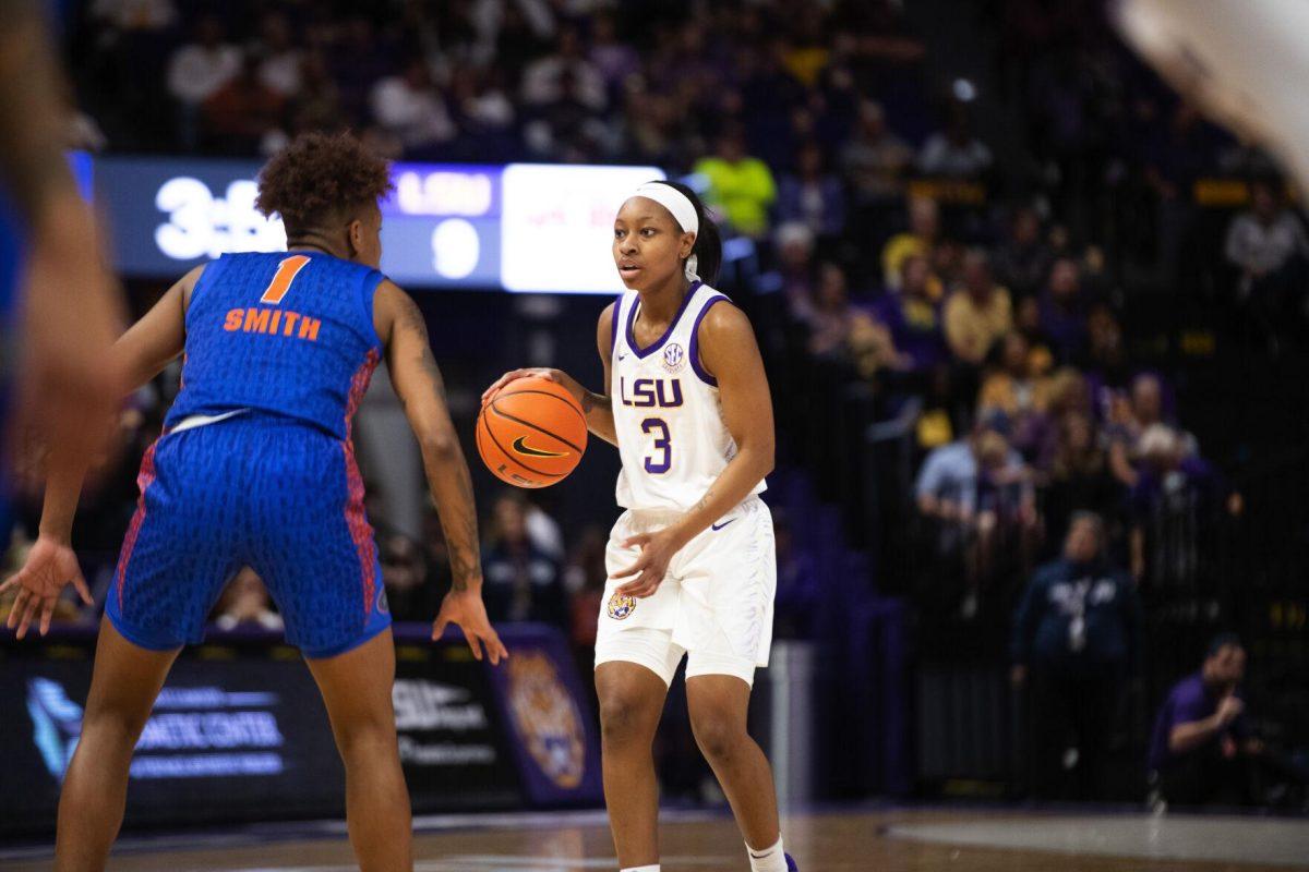 LSU women’s basketball graduate student guard Khayla Pointer (3) dribbles the ball down the court Sunday, Feb. 20, 2022, during LSU’s 66-61 win against Florida in the Pete Maravich Assembly Center on North Stadium Drive in Baton Rouge, La.