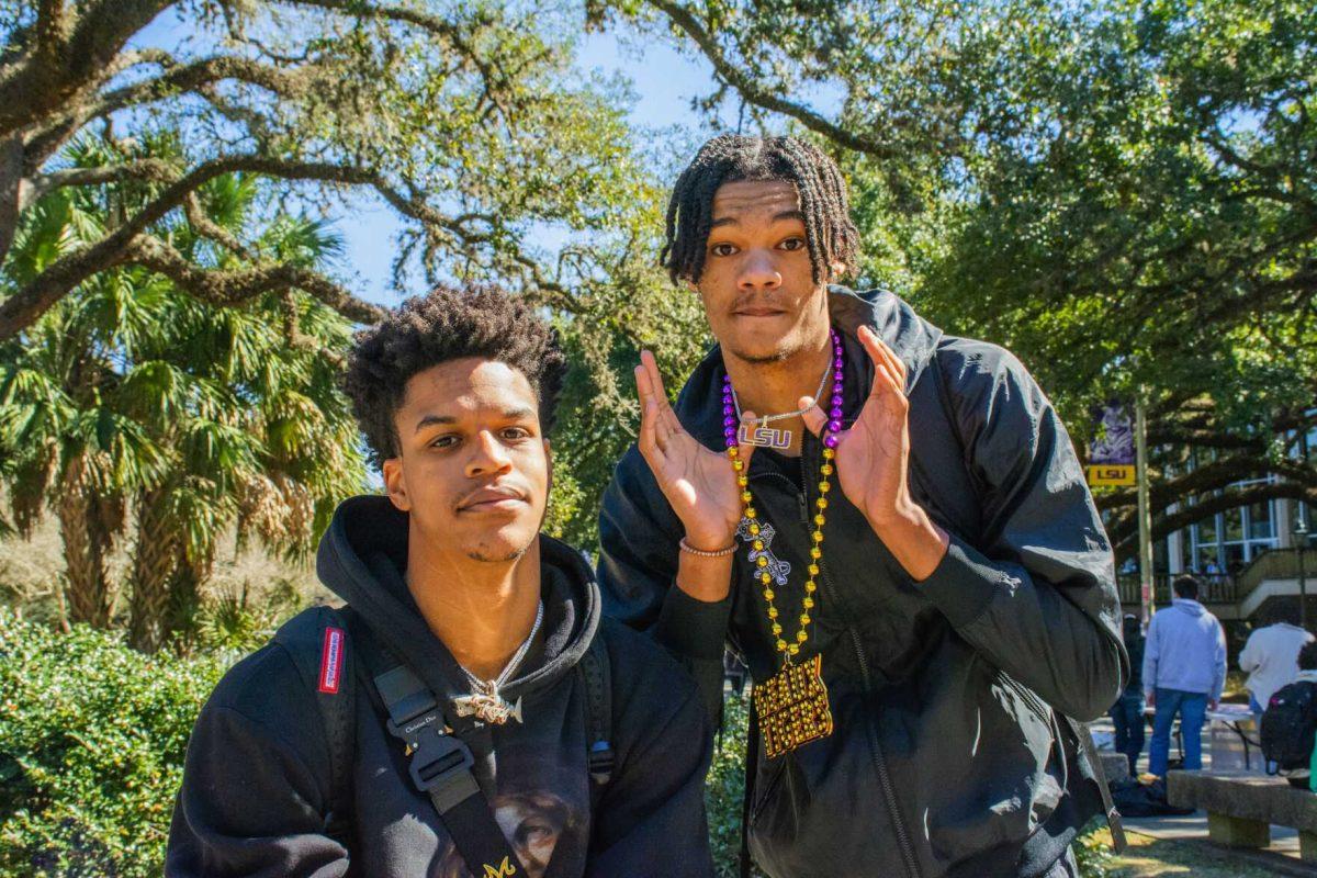 LSU men&#8217;s basketball junior forward Shareef O&#8217;Neal (24) poses with freshman forward Alex Fudge (3) Wednesday, Feb. 9, 2022 during the LSU Student Activities Board Mardi Gras Mambo event on Tower Drive at LSU's campus in Baton Rouge, La.