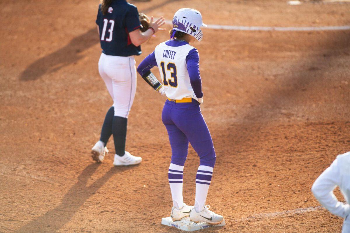 LSU softball sophomore infielder Danieca Coffey (13) stands on third base Saturday, Feb. 12, 2022, during LSU’s 8-1 win against South Alabama at Tiger Park on Skip Bertman Drive in Baton Rouge, La.