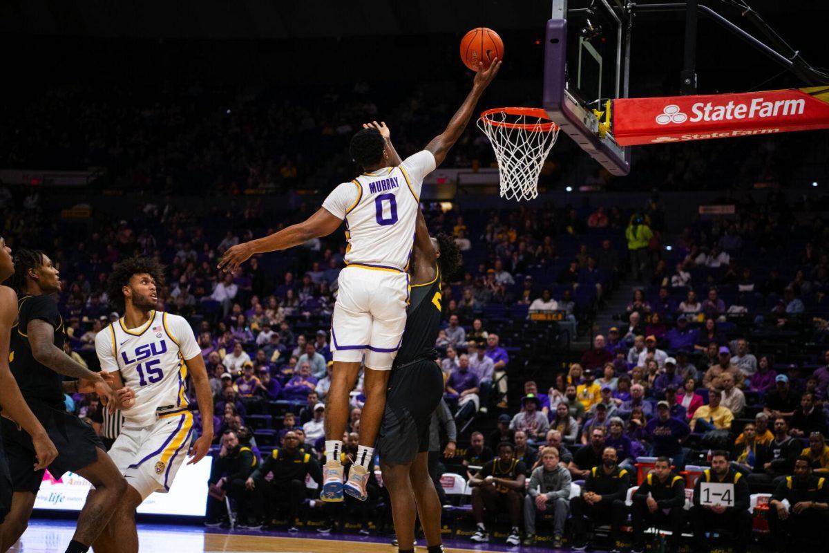 LSU men&#8217;s basketball freshman guard Brandon Murray (0) drives into the paint for a layup Saturday, Feb. 26, 2022, during LSU&#8217;s 75-55 win against Missouri in the Pete Maravich Assembly Center on North Stadium Drive in Baton Rouge, La.