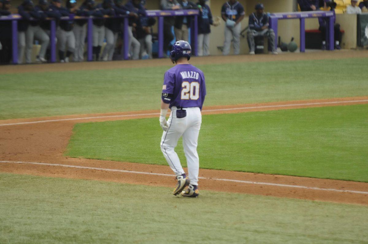 LSU sophomore catcher Alex Milazzo (20) walks back to home plate Saturday, Feb. 26, 2022, during the Tigers' 9-2 win against Southern University at Alex Box Stadium in Baton Rouge, La.