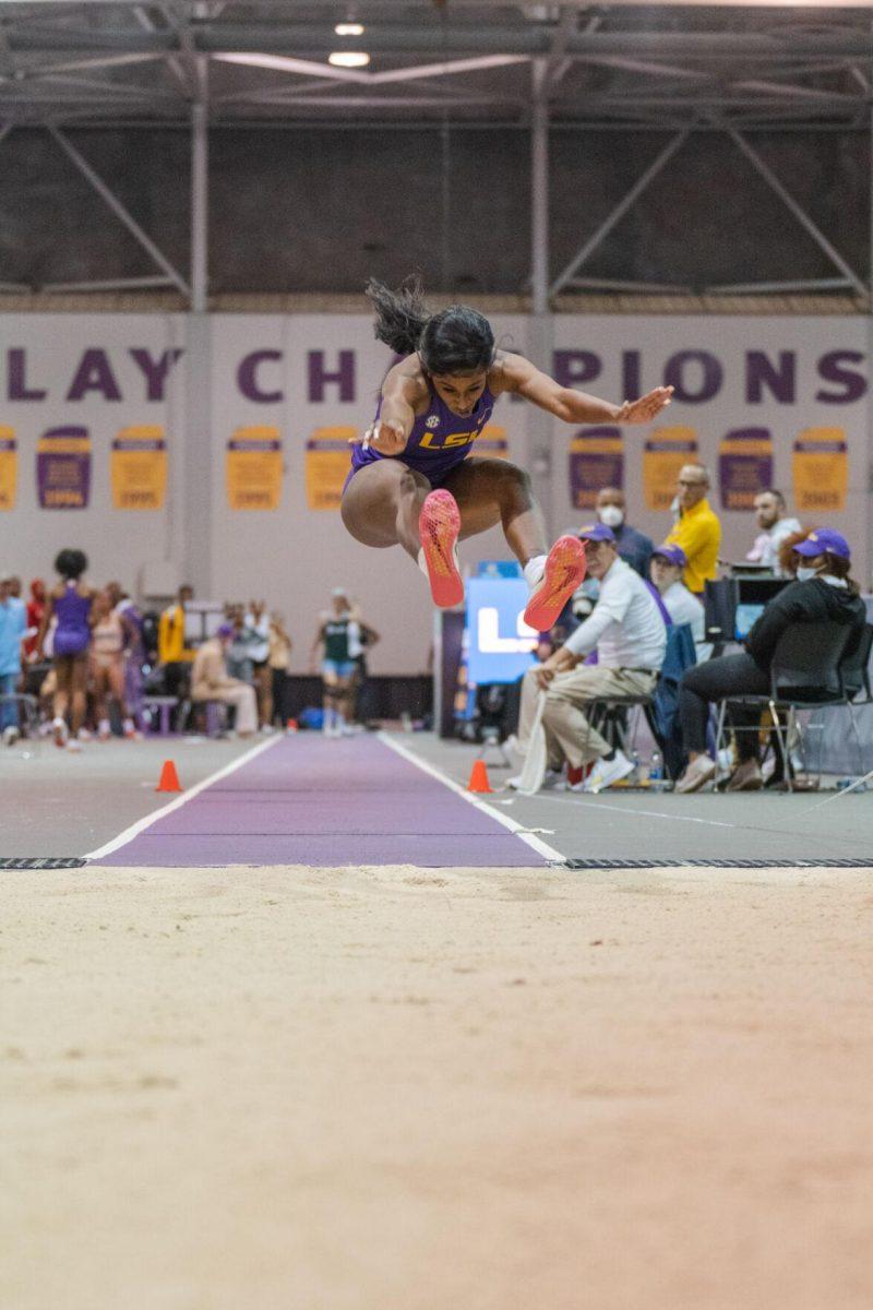 LSU track and field sophomore Serena Bolden reaches her legs out on Friday, Feb. 4, 2022, during the Bayou Bengal indoor track meet at the Carl Maddox Field House on Nicholson Drive in Baton Rouge, La.