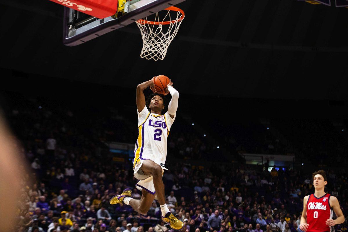 LSU men&#8217;s basketball sophomore guard Eric Gaines (2) flies through the air as he prepares to dunk the ball Tuesday, Feb. 01, 2022, during LSU&#8217;s 72-76 loss against Ole Miss in the Pete Maravich Assembly Center on North Stadium Drive in Baton Rouge, La.