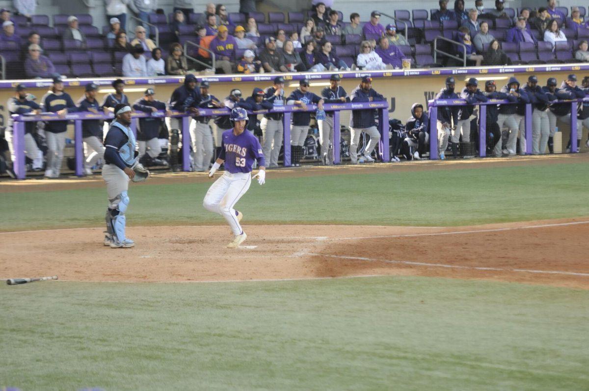 LSU sophomore infielder Jack Merrifield (53) scores a run Saturday, Feb. 26, 2022, during the Tigers' 9-2 win against Southern University at Alex Box Stadium in Baton Rouge, La.