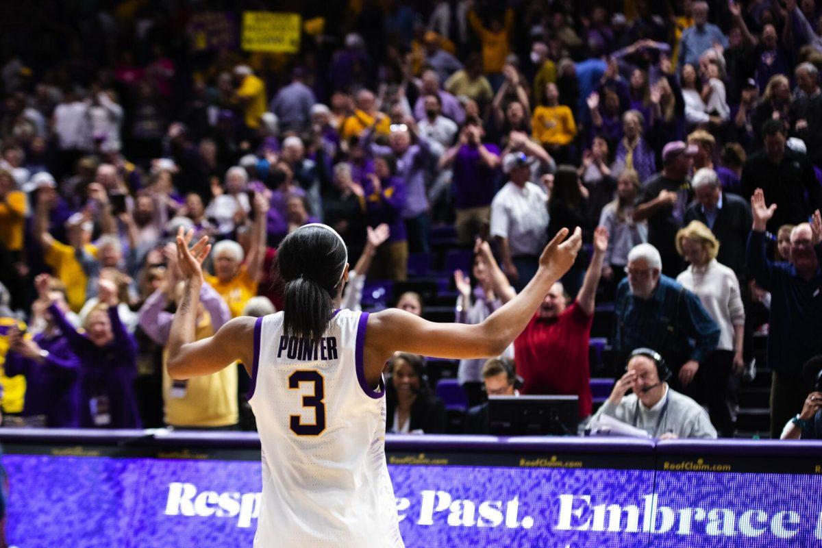 LSU women’s basketball graduate student guard Khayla Pointer (3) raises her hands to the crowd Sunday, Feb. 20, 2022, after LSU’s 66-61 win against Florida in the Pete Maravich Assembly Center on North Stadium Drive in Baton Rouge, La.