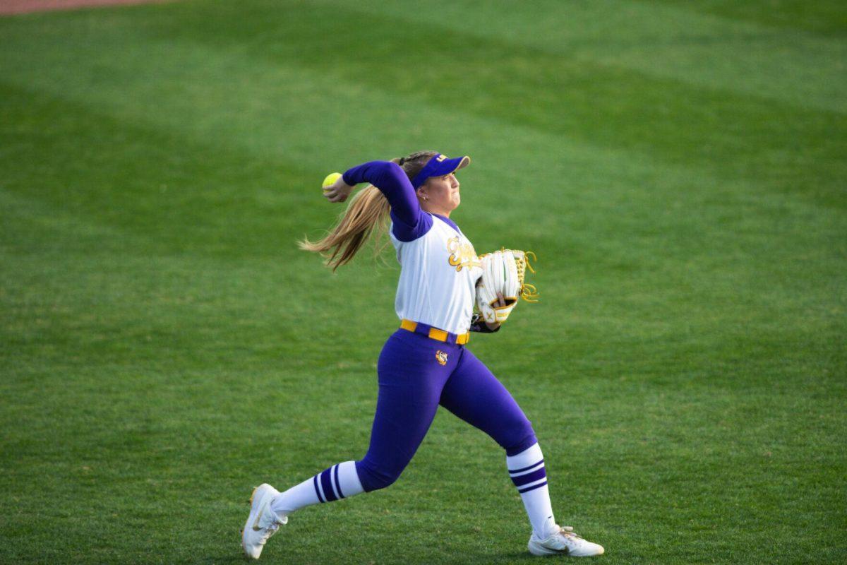 LSU softball junior outfielder Savannah Stewart (8) prepares to throw the ball infield Saturday, Feb. 12, 2022, during LSU’s 8-1 win against South Alabama at Tiger Park on Skip Bertman Drive in Baton Rouge, La.
