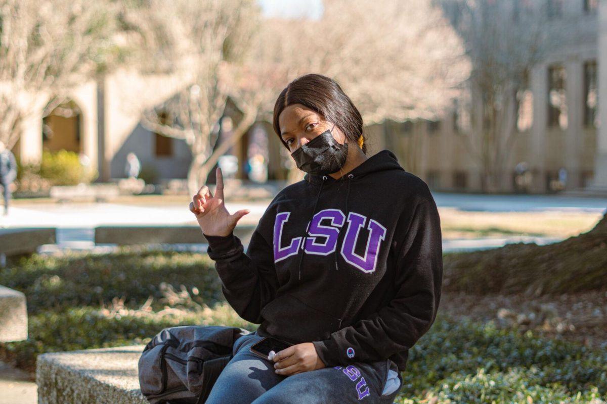 LSU sophomore biological sciences major Heaven Harris wears an LSU sweatshirt on Tuesday, Feb. 8, 2022, in the LSU Quad in Baton Rouge, La.