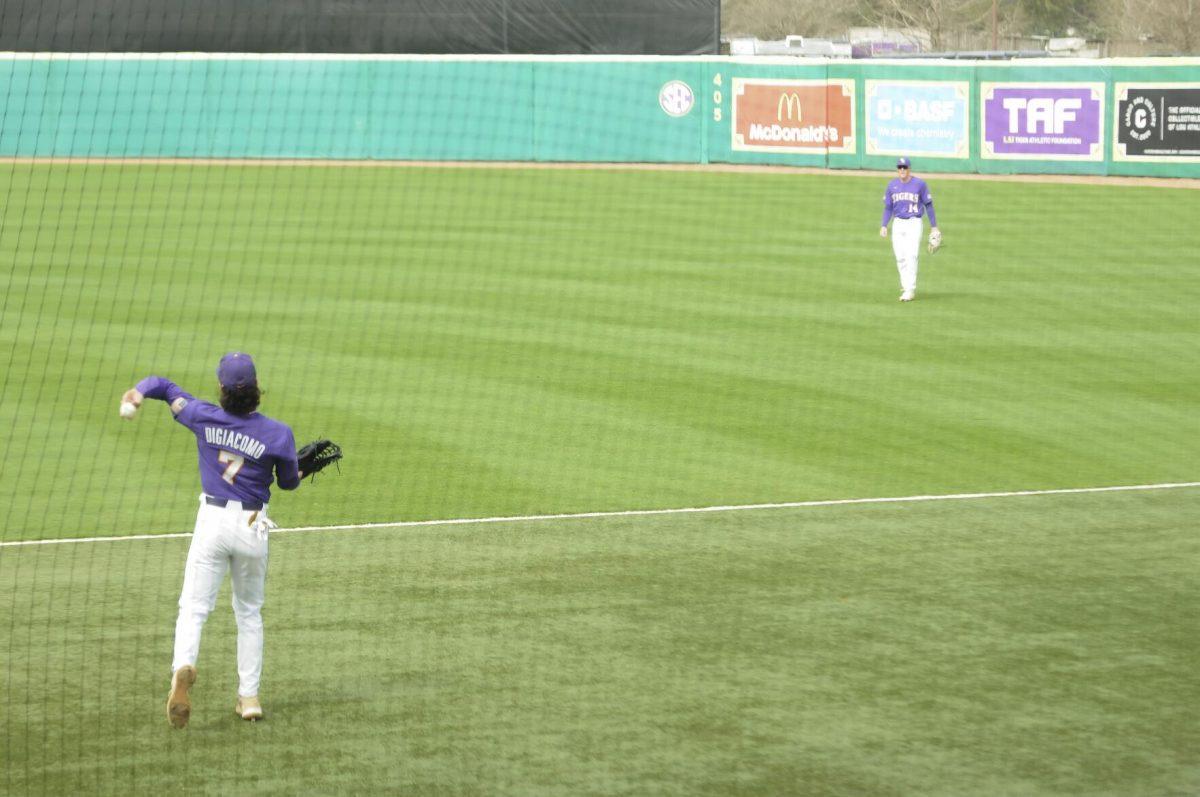 LSU junior outfielder Giovanni DiGiacomo (7) throws the ball to LSU sophomore infielder Jacob Berry (14) Saturday, Feb. 26, 2022, during the Tigers' 9-2 win against Southern University at Alex Box Stadium in Baton Rouge, La.