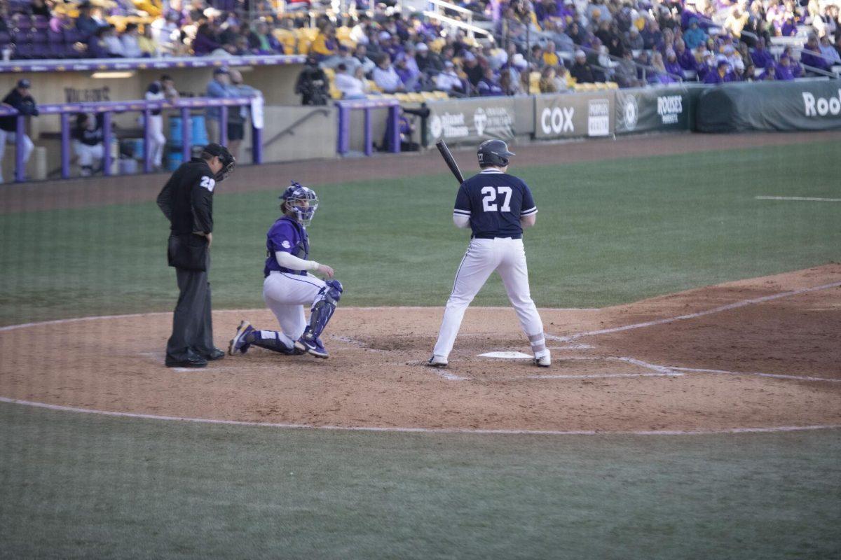 University of Maine senior catcher Ryan Turenne (27) swings at bat Saturday, Feb. 19, 2022, during the Tigers' 17-8 win against the University of Maine at Alex Box Stadium in Baton Rouge, La.