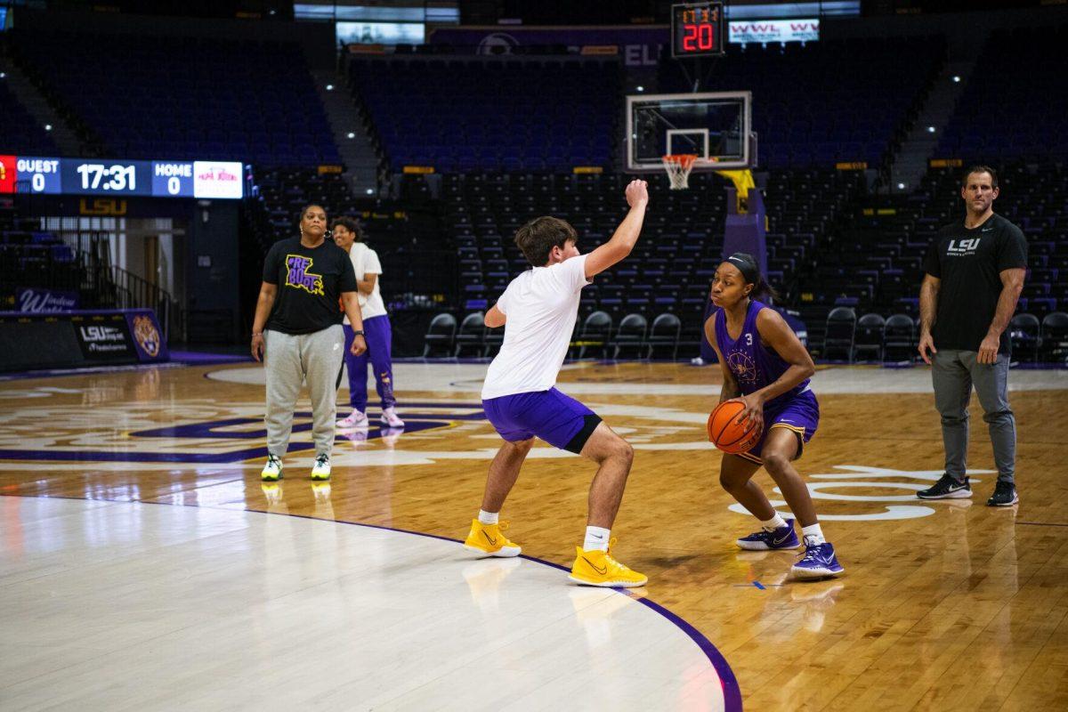 Dream Team Henrik Wold guards LSU women&#8217;s basketball graduate student guard Khayla Pointer (3) Wednesday, Feb. 9, 2022 during the LSU women&#8217;s basketball team in the Pete Maravich Assembly Center on N. Stadium Drive in Baton Rouge, La.