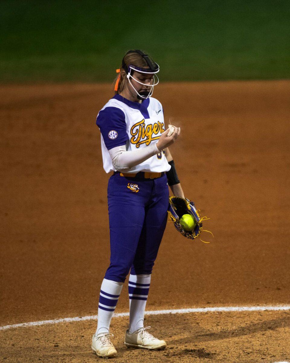 LSU softball freshman pitcher Raelin Chaffin (34) holds a powder bag Saturday, Feb. 12, 2022, during LSU’s 2-3 loss against Central Arkansas at Tiger Park on Skip Bertman Drive in Baton Rouge, La.
