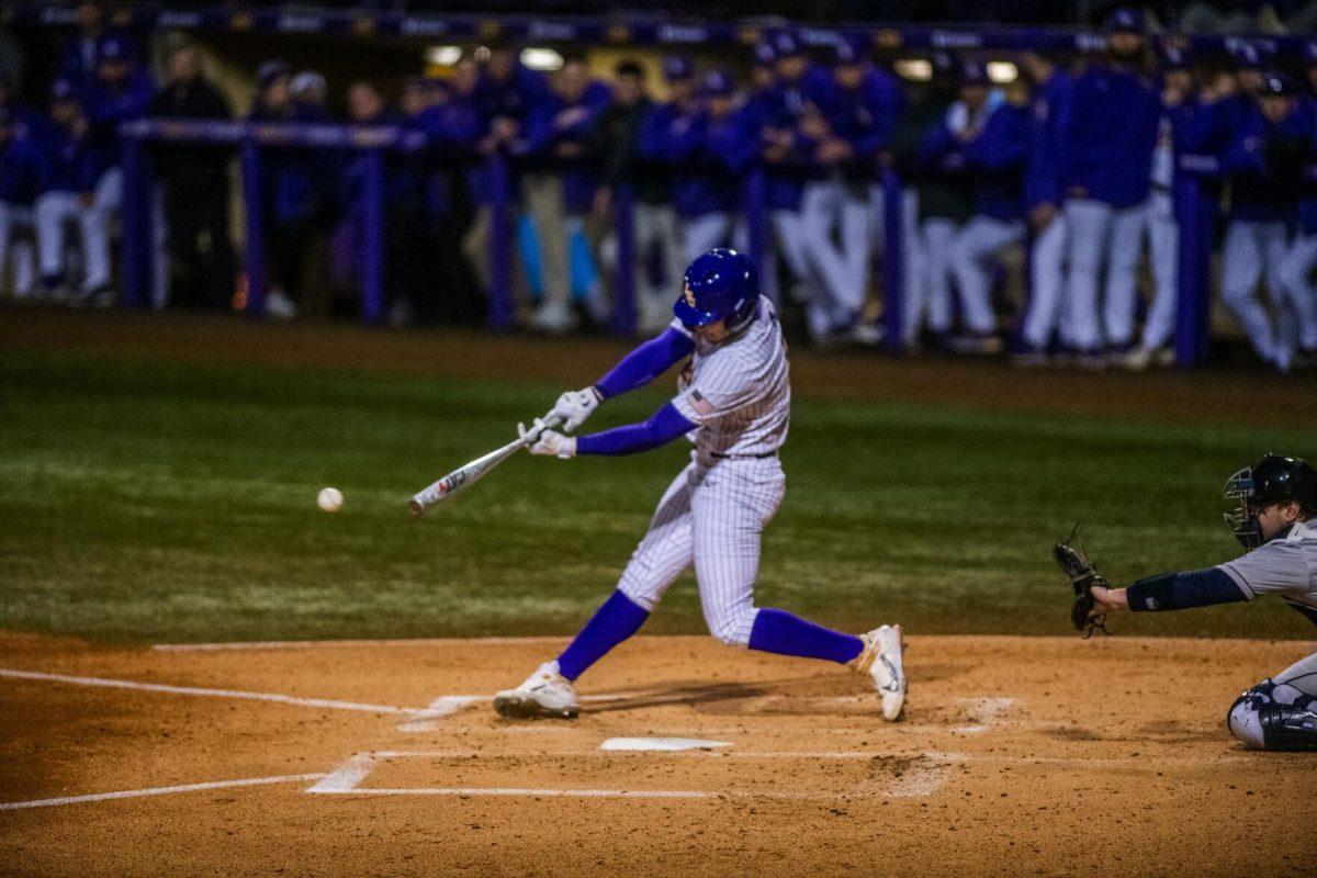 LSU baseball redshirt sophomore outfielder Brayden Jobert (6) hits the ball Friday, Feb. 18, 2022 during LSU's 13-1 win against Maine at Alex Box Stadium on Gourrier Avenue in Baton Rouge, La.