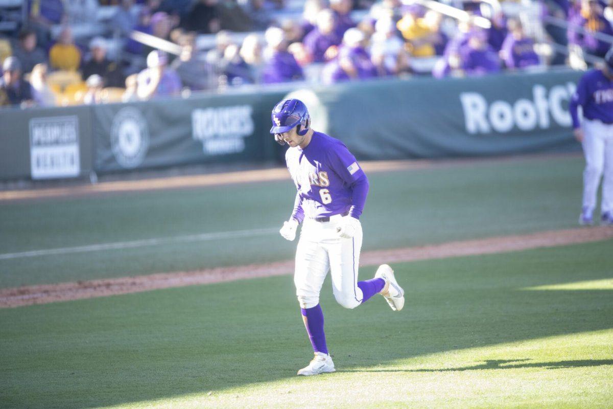 LSU sophomore outfielder Brayden Jobert (6) jogs back to the dugout after going out Saturday, Feb. 19, 2022, during the Tigers' 17-8 win against the University of Maine at Alex Box Stadium in Baton Rouge, La.