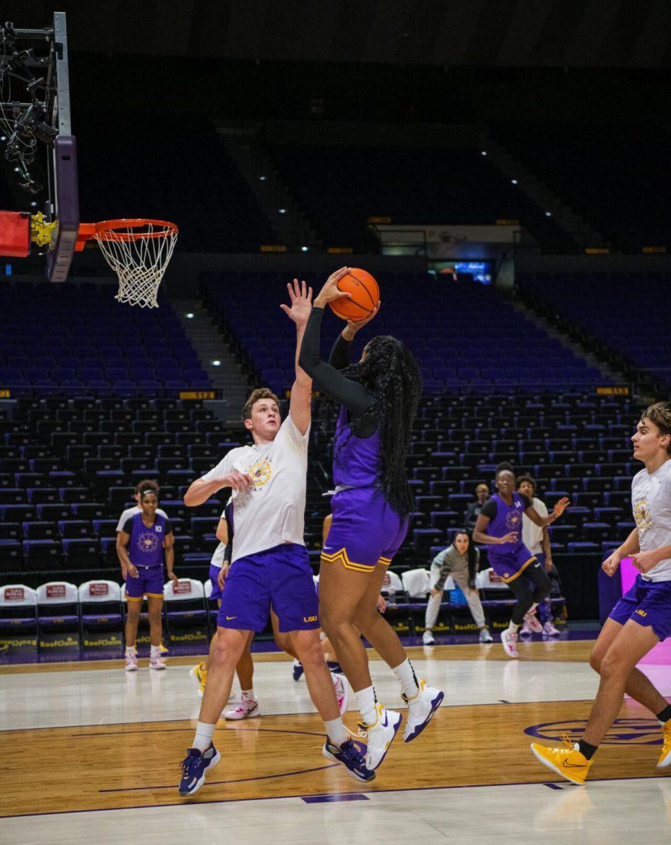 Dream Team Christian Weaver defends LSU women&#8217;s basketball 5th-year senior guard/forward Awa Trasi (32) Wednesday, Feb. 9, 2022 during the LSU women&#8217;s basketball team in the Pete Maravich Assembly Center on N. Stadium Drive in Baton Rouge, La.