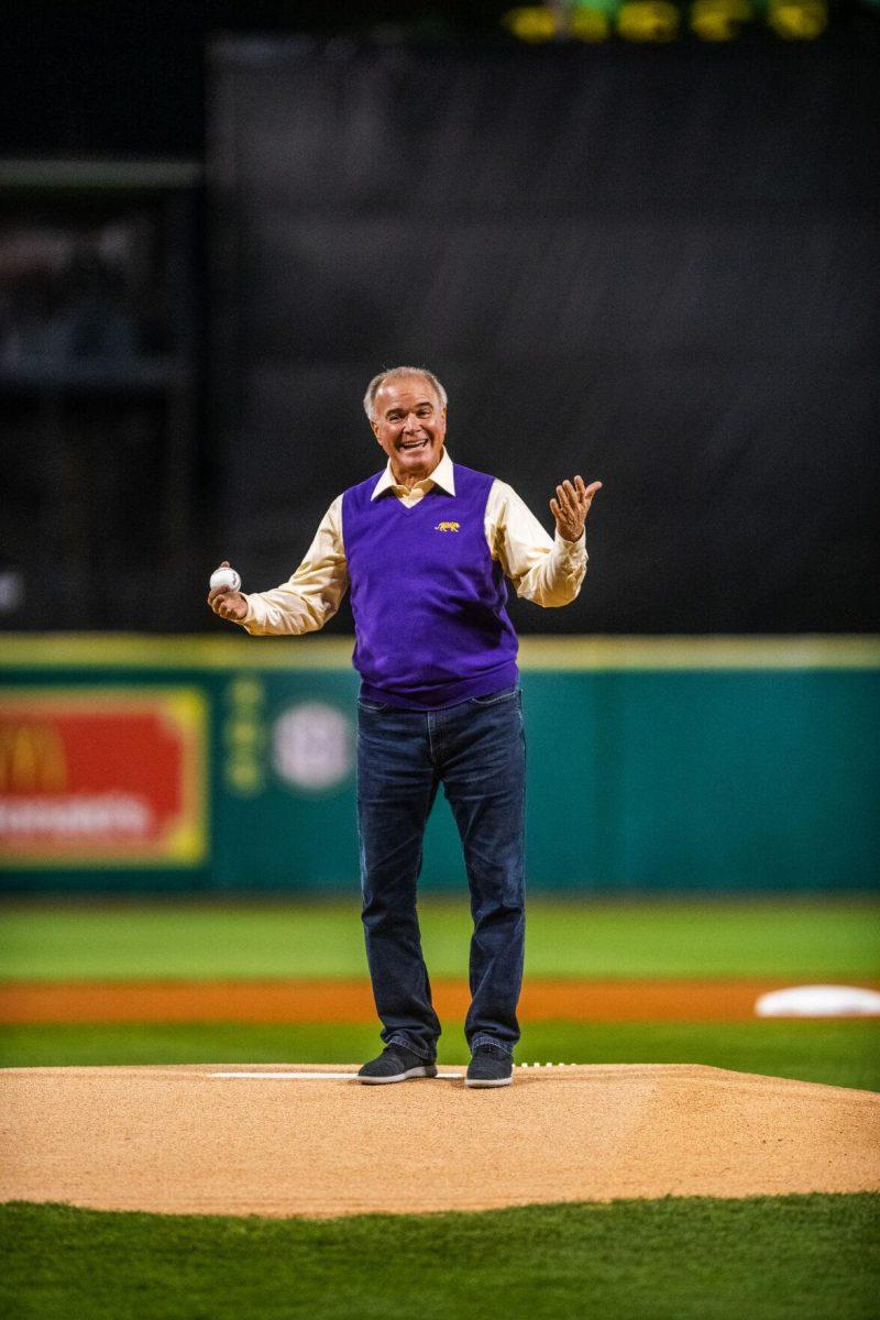 Former head coach Paul Mainieri throws out the first pitch Friday, Feb. 18, 2022 before LSU's 13-1 win against Maine at Alex Box Stadium on Gourrier Avenue in Baton Rouge, La.