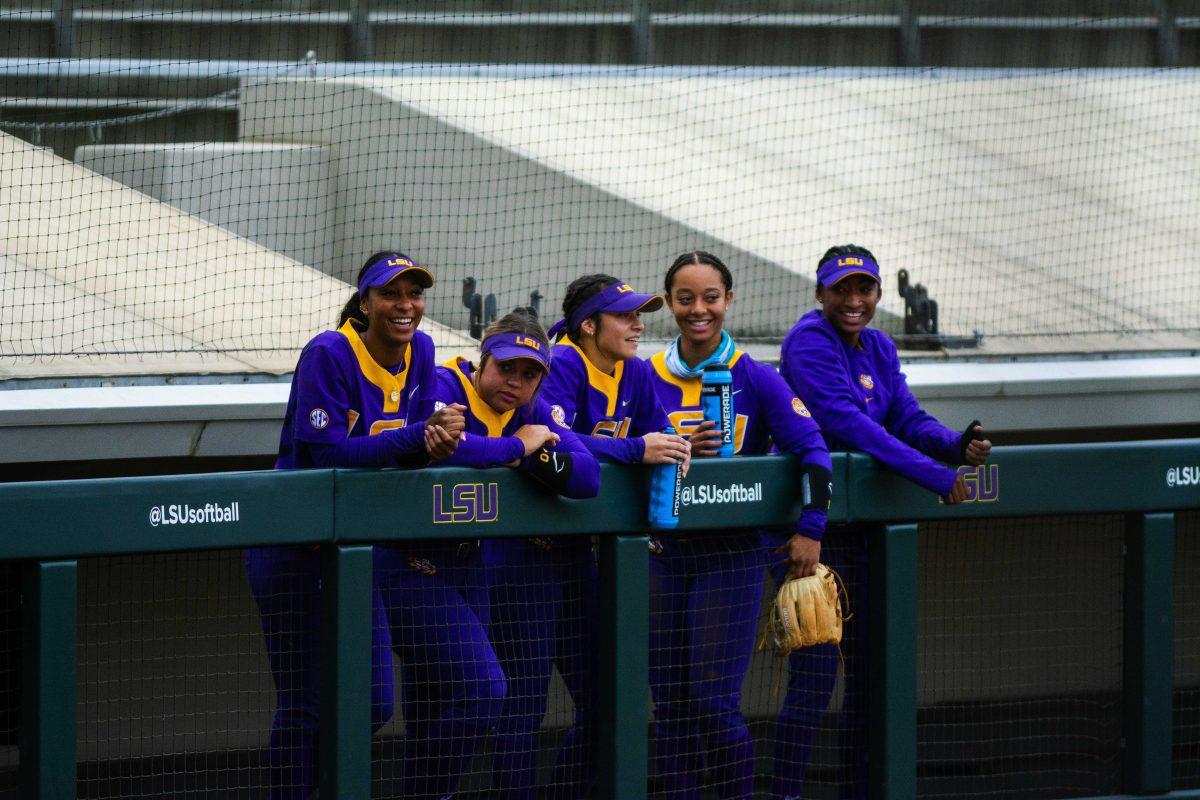 LSU softball purple team cheers their teammates on during the Purple and Gold World Series on Thursday, Nov. 18, 2021, at Tiger Park in Baton Rouge, La.