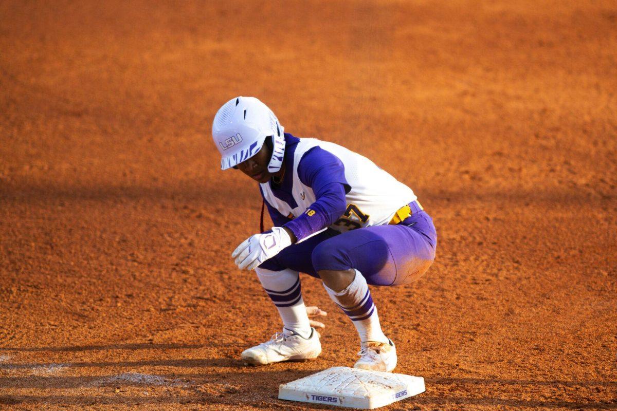 LSU softball sophomore pitcher Morgan Smith (37) gets up after sliding to second base Saturday, Feb. 12, 2022, during LSU’s 8-1 win against South Alabama at Tiger Park on Skip Bertman Drive in Baton Rouge, La.