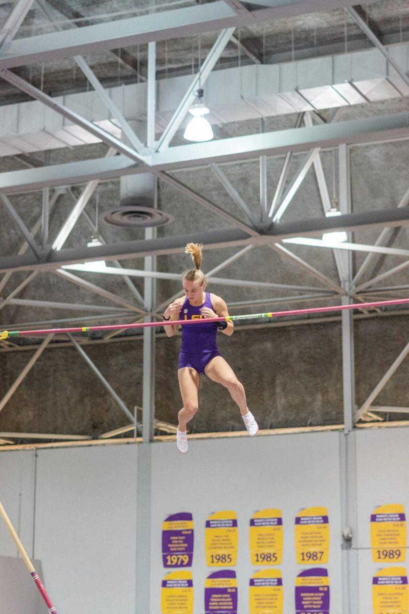 LSU track and field pole vault fifth-year senior Lisa Gunnarsson clears the bar on Friday, Feb. 18, 2022, during the LSU Twilight track and field meet in the Carl Maddox Field House on Nicholson Drive in Baton Rouge, La.