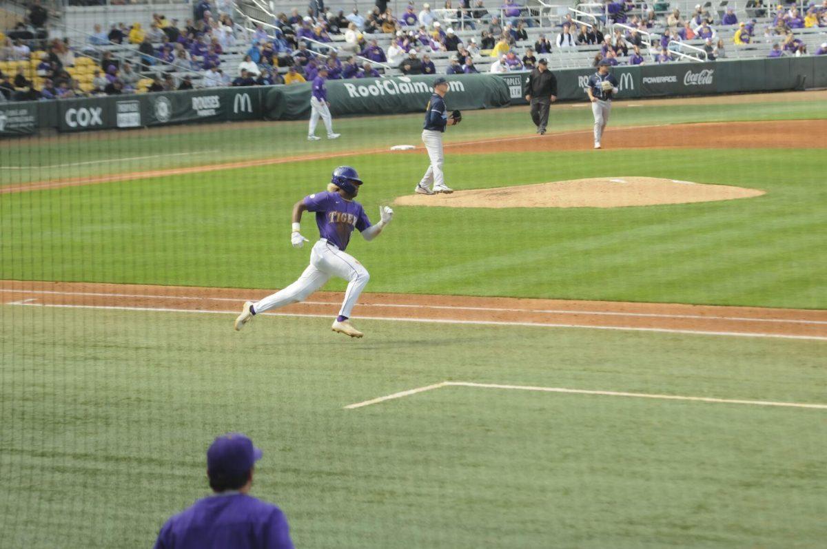 LSU sophomore first basemen Tre' Morgan (18) runs for the double Saturday, Feb. 26, 2022, during the Tigers' 9-2 win against Southern University at Alex Box Stadium in Baton Rouge, La.