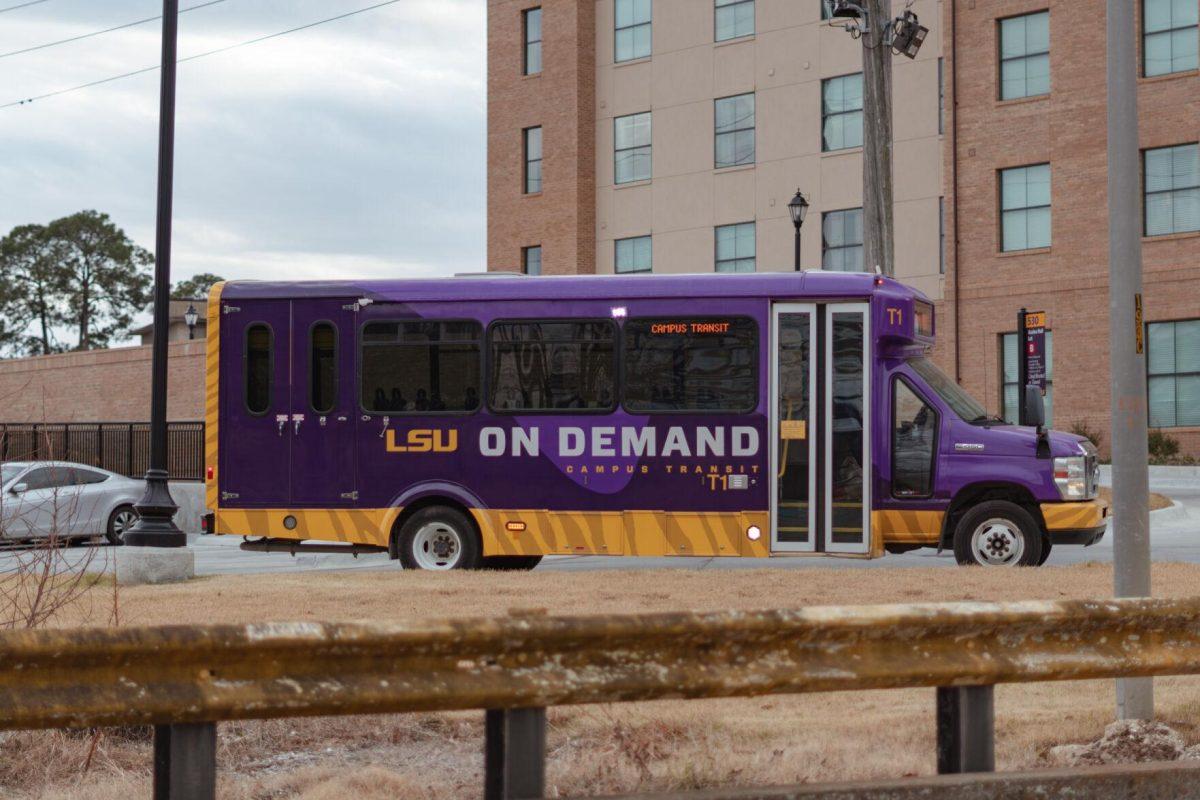 Lettering reads &#8220;On Demand&#8221; on Wednesday, Feb. 16, 2022, on the side of an LSU shuttle parked by Azalea Hall on South Campus Drive in Baton Rouge, La.