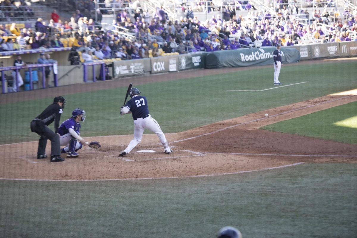 University of Maine senior catcher Ryan Turenne (27) swings at bat Saturday, Feb. 19, 2022, during the Tigers' 17-8 win against the University of Maine at Alex Box Stadium in Baton Rouge, La.