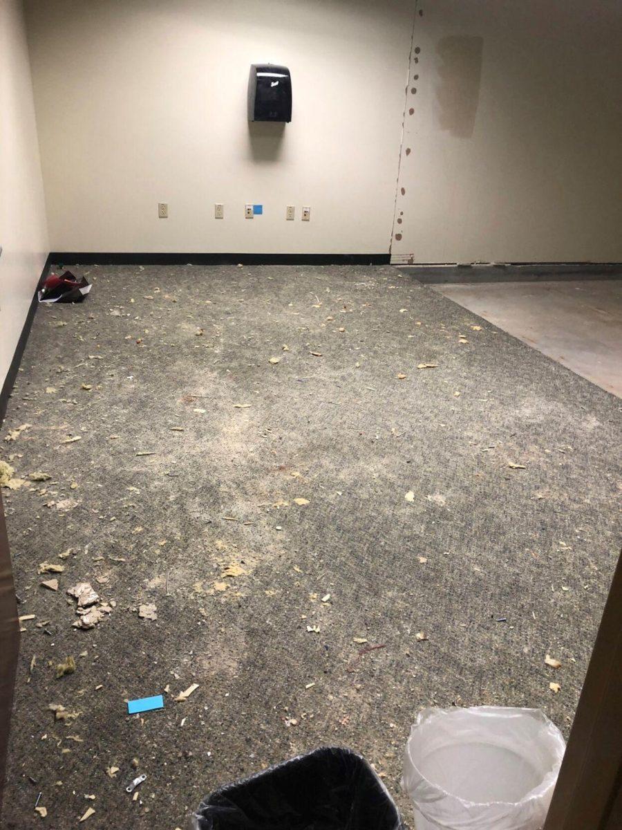 Hatcher Hall room 55 following the removal of audiological sound booth.&#160;