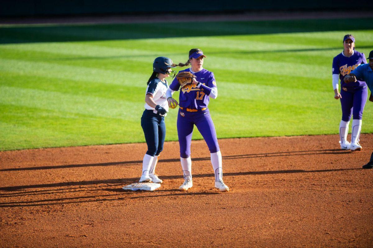 LSU softball redshirt sophomore infielder Taylor Pleasants (17) tags the runner to end the inning Friday, Feb. 11, 2022, during the Tigers' 3-0 win against South Alabama at Tiger Park in Baton Rouge, La.