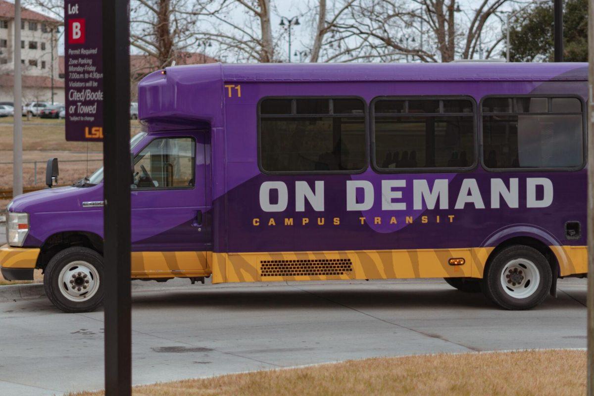 Lettering reads &#8220;On Demand&#8221; on Wednesday, Feb. 16, 2022, on the side of an LSU shuttle parked by Azalea Hall on South Campus Drive in Baton Rouge, La.