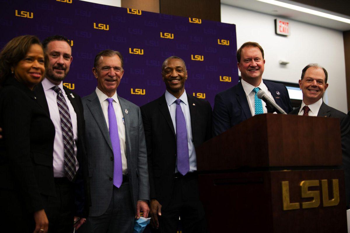 LSU president William F. Tate IV, Scott Wester president and CEO of Our Lady of the Lake, Greg Feirn, CEO of LCMC Health and others pose for a picture after the Our Lady of the Lake and LCMC Health game-changing investment press conference Friday, Feb. 11, 2022, at the LSU Foundation Center for Philanthropy in Baton Rouge, La.