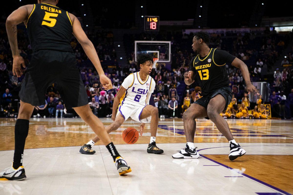 LSU men&#8217;s basketball sophomore guard Eric Gaines (2) dribbles behind his back Saturday, Feb. 26, 2022, during LSU&#8217;s 75-55 win against Missouri in the Pete Maravich Assembly Center on North Stadium Drive in Baton Rouge, La.