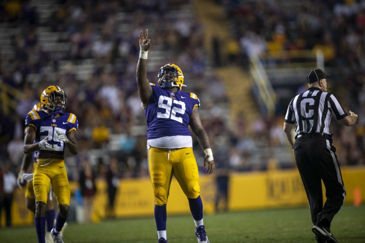 LSU football graduate defensive tackle Neil Farrell Jr (92) celebrates a tackle Saturday, Sept. 18, 2021, during the LSU vs Central Michigan game in Tiger Stadium.