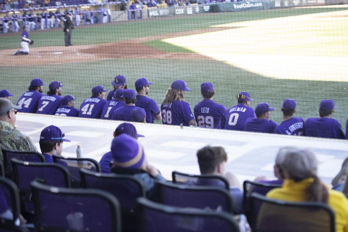 The LSU baseball team wtaches from the dugout Saturday, Feb. 19, 2022, during the Tigers' 17-8 win against the University of Maine at Alex Box Stadium in Baton Rouge, La.