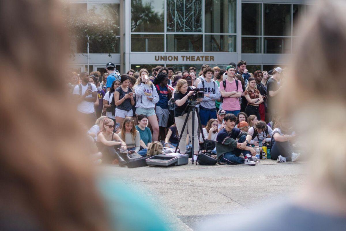 A woman films Sister Cindy&#8217;s speech on Monday, Feb. 21, 2022, in Free Speech Plaza on LSU&#8217;s Campus in Baton Rouge, La.