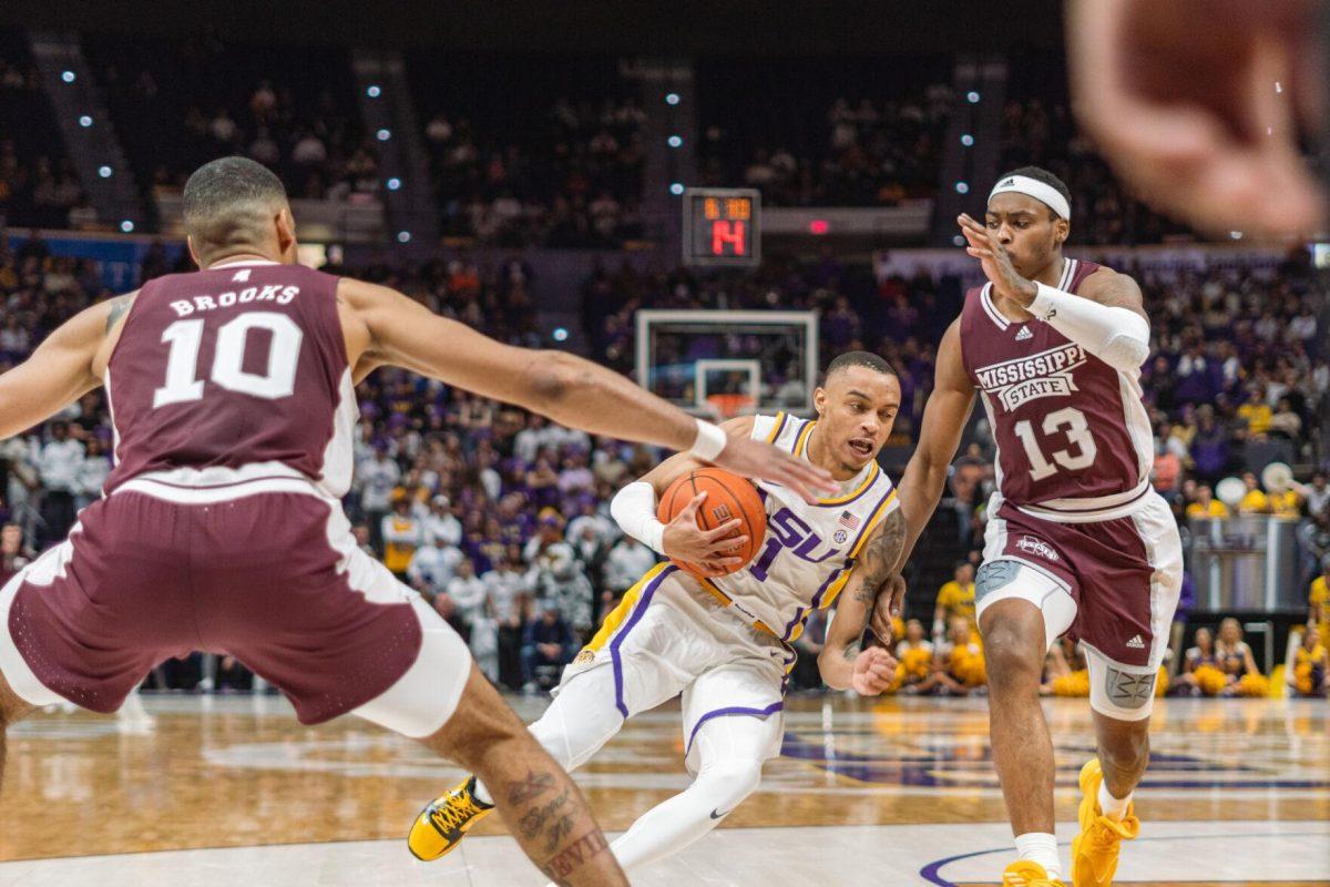 LSU men&#8217;s basketball senior guard Xavier Pinson (1) drives toward the goal on Saturday, Feb. 12, 2022, during LSU&#8217;s 69-65 win over Mississippi State at the Pete Maravich Assembly Center on North Stadium Drive in Baton Rouge, La.