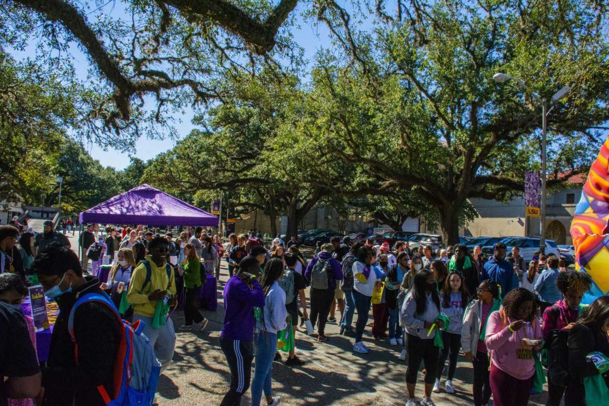 LSU students enjoy Mardi Gras Mambo Wednesday, Feb. 9, 2022 during the LSU Student Activities Board event on Tower Drive at LSU's campus in Baton Rouge, La.