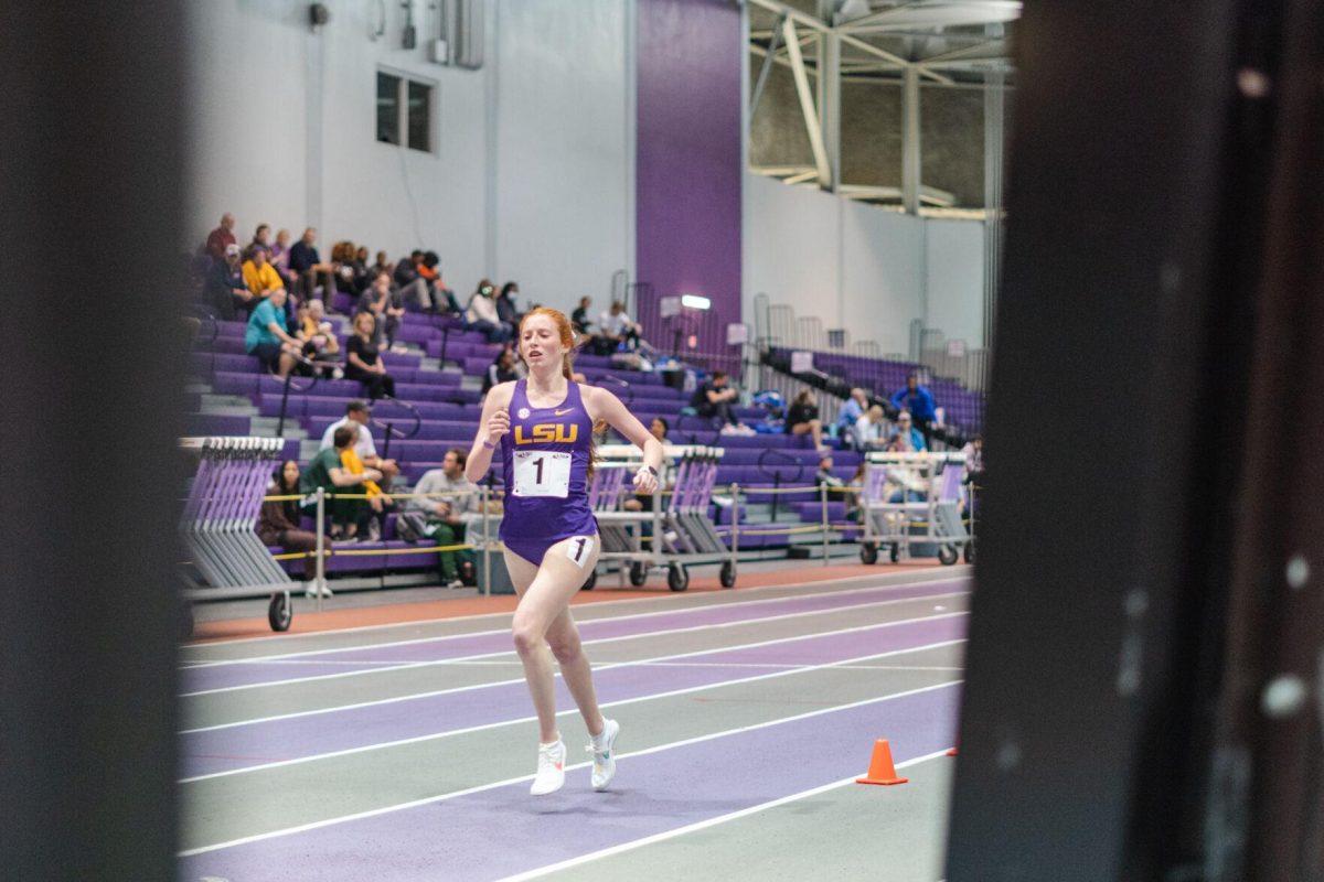 LSU track and field distance freshman Sophie Martin nears the finish line on Friday, Feb. 18, 2022, during the LSU Twilight track and field meet in the Carl Maddox Field House on Nicholson Drive in Baton Rouge, La.