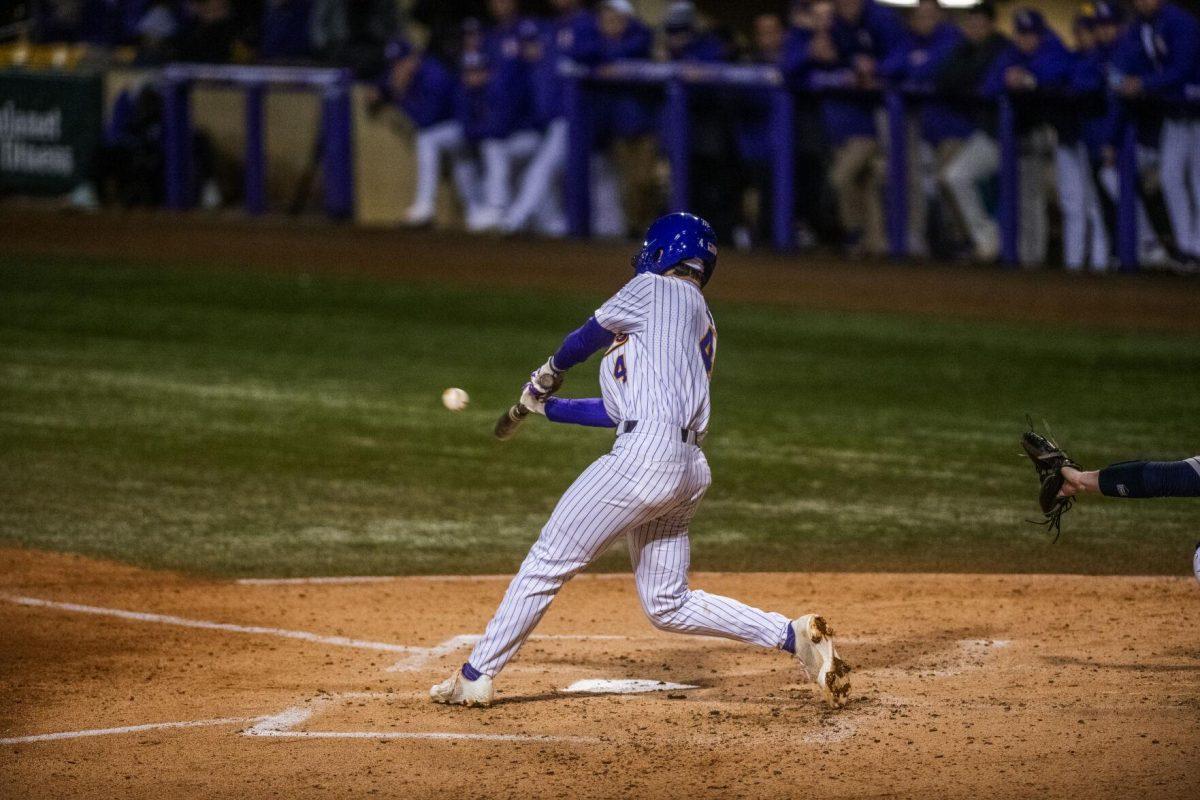 LSU baseball sophomore infielder Cade Doughty (4) hits the ball Friday, Feb. 18, 2022 during LSU's 13-1 win against Maine at Alex Box Stadium on Gourrier Avenue in Baton Rouge, La.