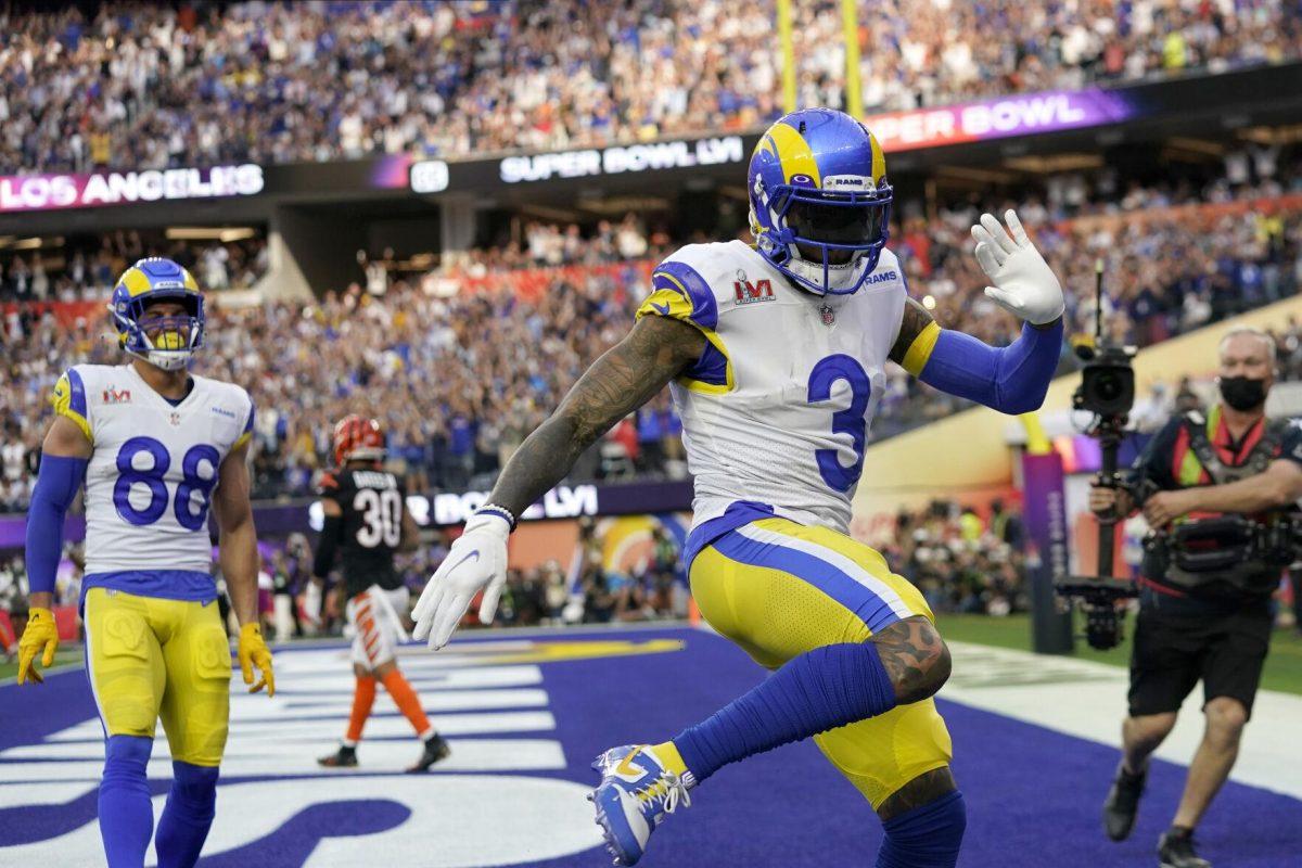 Los Angeles Rams wide receiver Odell Beckham Jr. (3) reacts after scoring a touchdown against the Cincinnati Bengals during the first half of the NFL Super Bowl 56 football game Sunday, Feb. 13, 2022, in Inglewood, Calif. (AP Photo/Lynne Sladky)