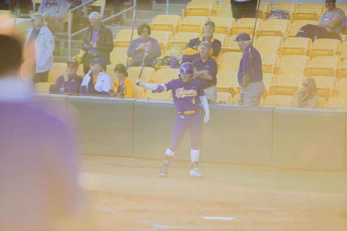 LSU softball freshman outfielder McKenzie Redoutey (4) prepares for her at bat Friday, Feb. 11, 2022, during the Tigers' 3-0 win against South Alabama at Tiger Park in Baton Rouge, La.