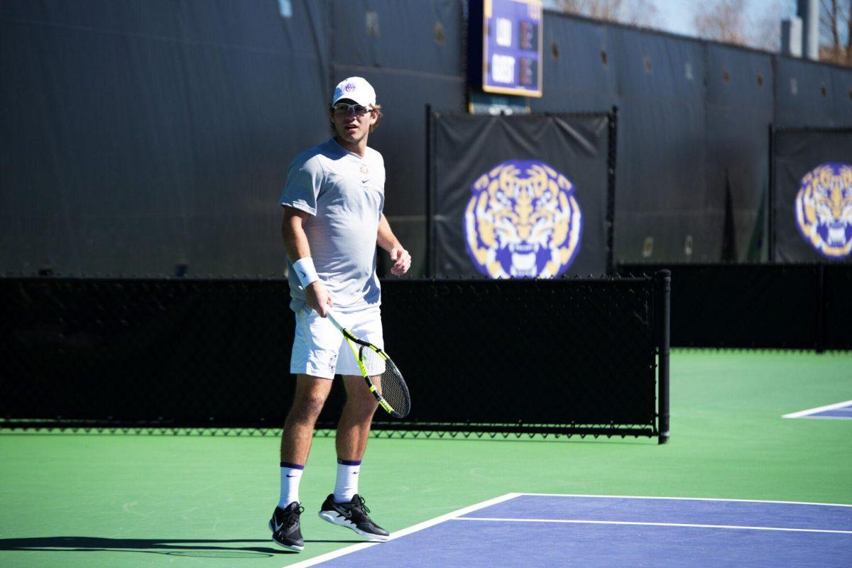 LSU men's tennis junior Nick Watson stands on the court Sunday, Feb. 13, 2021 during LSU's 6-1 win over Purdue at the LSU Tennis Complex on Gourrier Avenue in Baton Rouge, La.