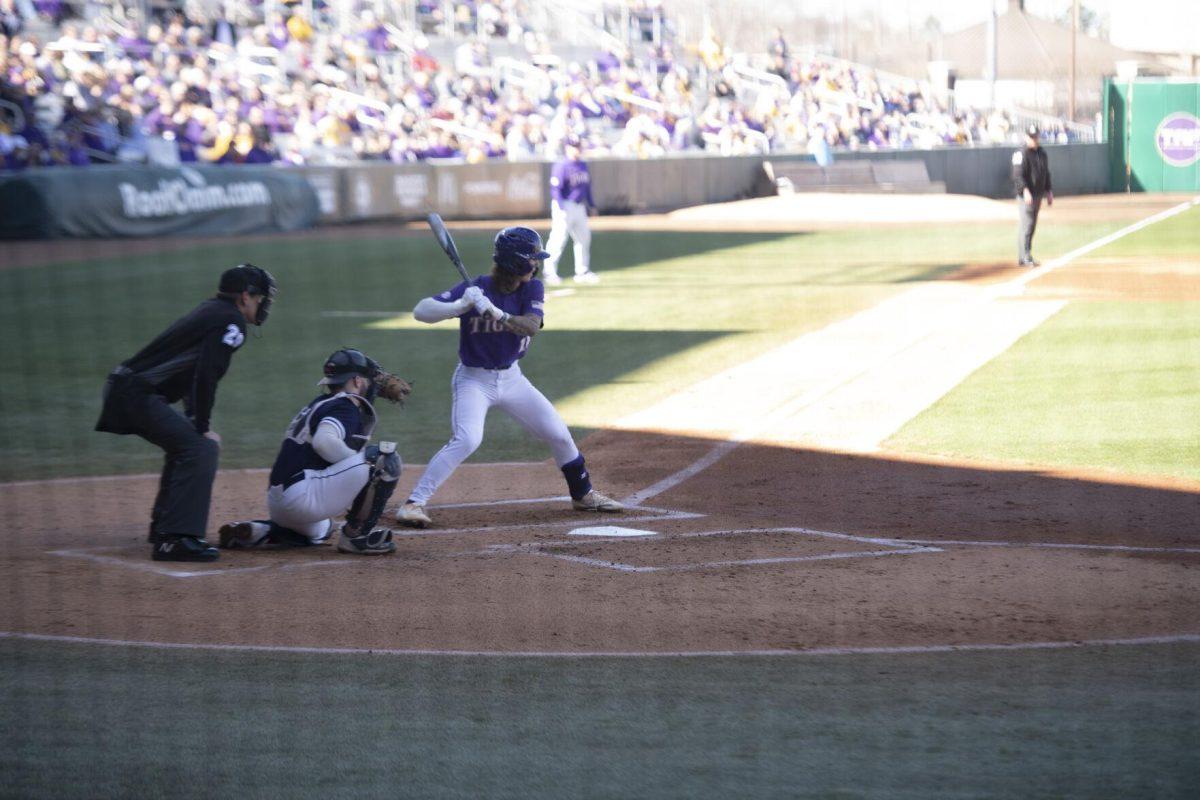 LSU sophomore infielder Jordan Thompson (13) gets ready to swing Saturday, Feb. 19, 2022, during the Tigers' 17-8 win against the University of Maine at Alex Box Stadium in Baton Rouge, La.