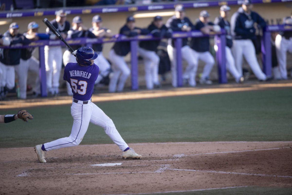 LSU sophomore infielder Jack Merrifield swings and hits the ball Saturday, Feb. 19, 2022, during the Tigers' 17-8 win against the University of Maine at Alex Box Stadium in Baton Rouge, La.