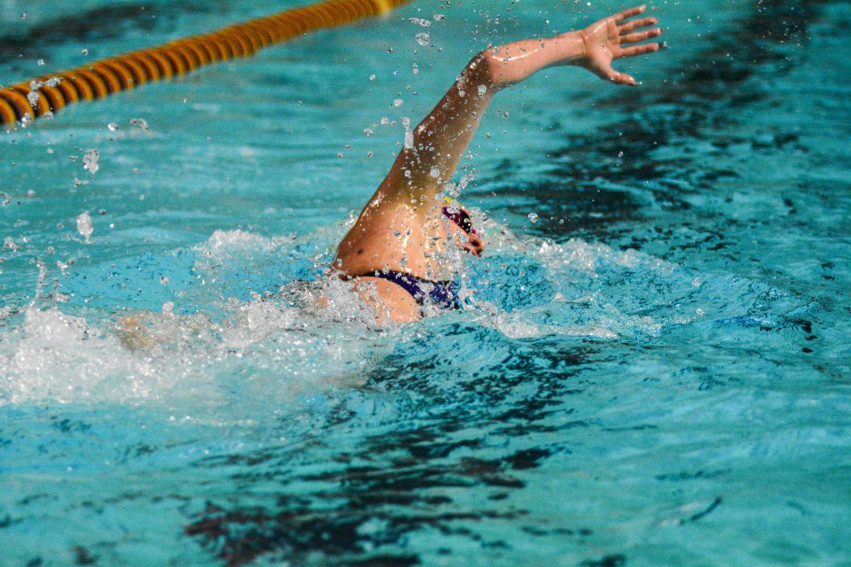 An LSU swimmer swims Saturday, Jan. 22, 2022, during LSU women's 111.5-181.5 loss against Texas A&amp;M at the LSU Natatorium in Baton Rouge, La.