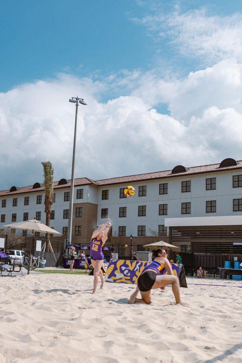 LSU beach volleyball sophomore Amber Haynes (12) returns the ball on Sunday, March 6, 2022, during LSU&#8217;s 3-2 win over Loyola Marymount at the Beach Volleyball Stadium on Cypress Drive in Baton Rouge, La.